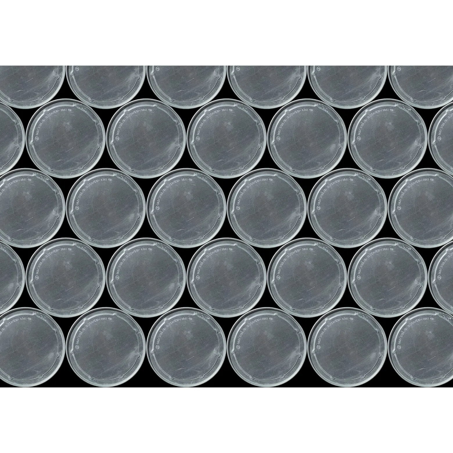 Fototapete Vlies Fassdeckel Kreise grau schwarz