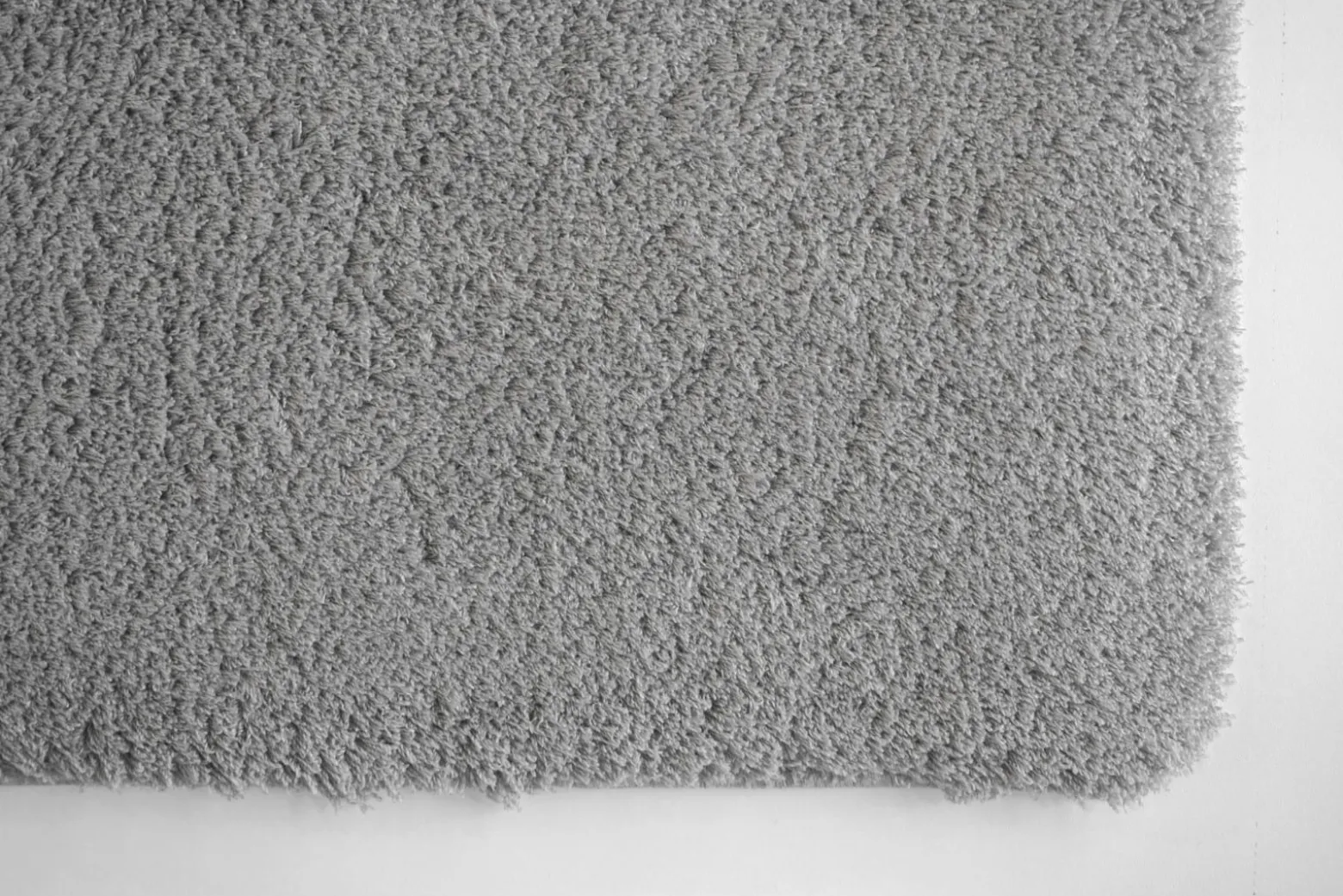 Teppich flauschig einfarbig hellgrau Hochflor Astra Salerno